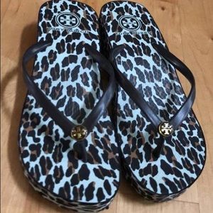 Tory Burch wedge sandals leopard print.